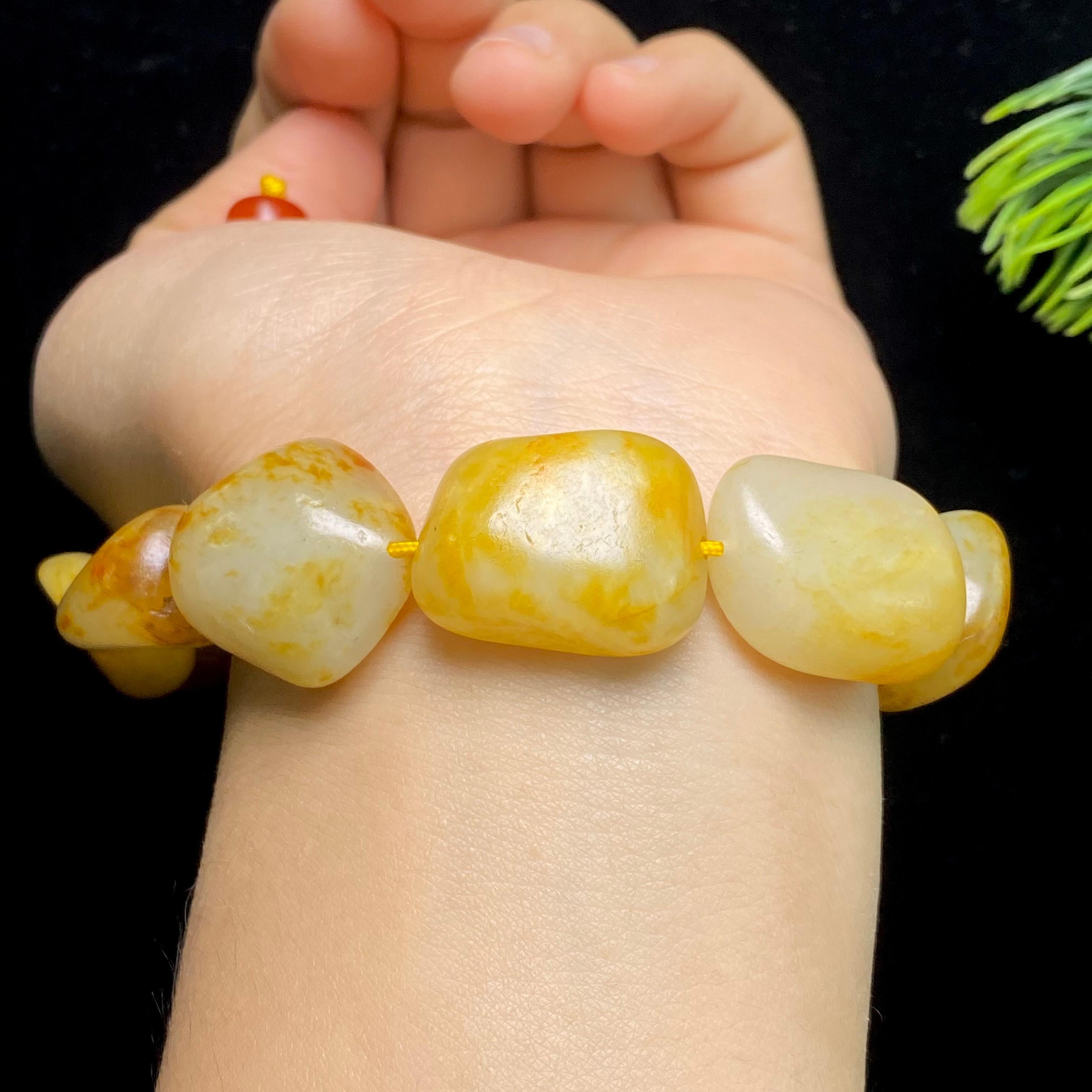 和田玉黄皮籽料手串（68.4g）