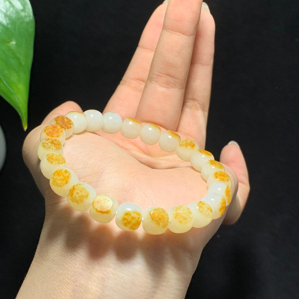和田洒金皮籽料白玉老型珠手串（26.7g）