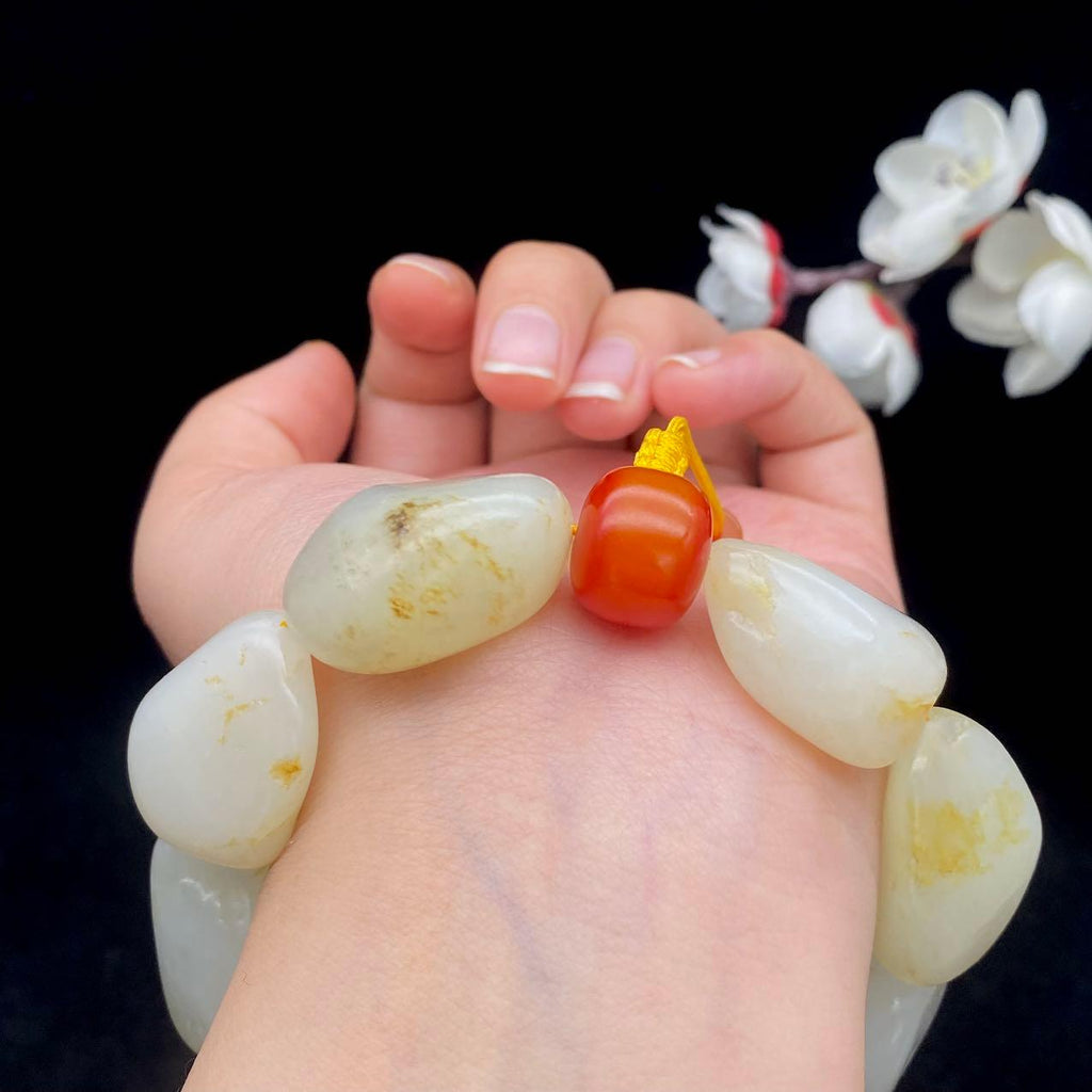 和田玉洒金皮籽料【精品手串】（106.4g）