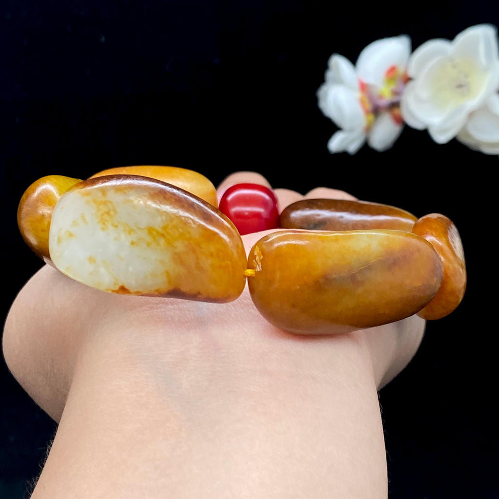 和田玉聚黄皮籽料【精品手串】（98.4g）