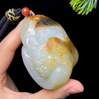 和田玉籽料子母瑞兽把件（157.2g）