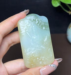 新疆和田玉且末糖白羊脂玉带翠文殊菩萨（59.3g）