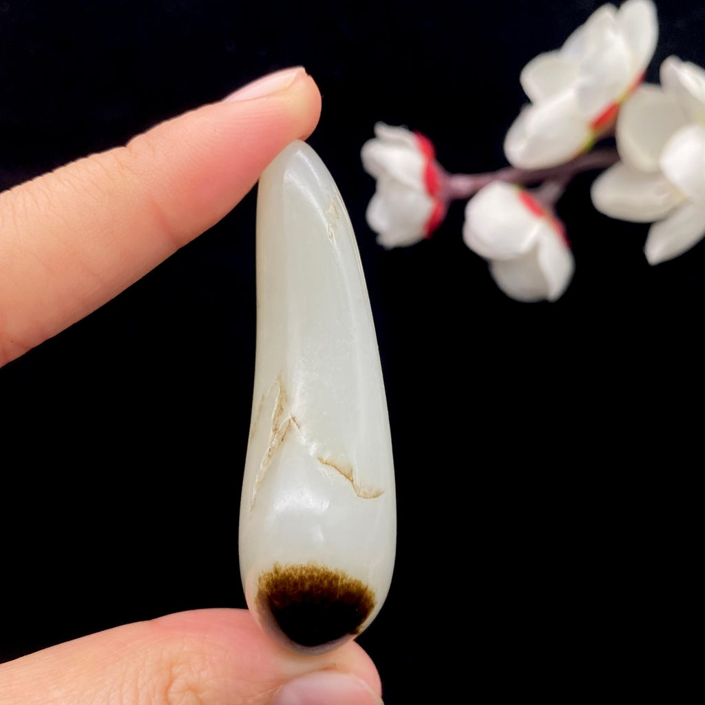 和田玉聚黑皮籽料原石（37.3g）