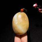 新疆且末糖白玉佛公手把件（83.5g）