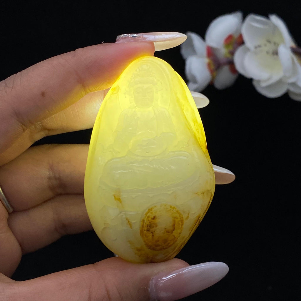 和田玉洒金皮籽料【坐观音】（85.9g）