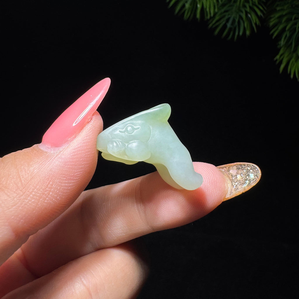 和田玉籽料带翠玉兔（6.0g）