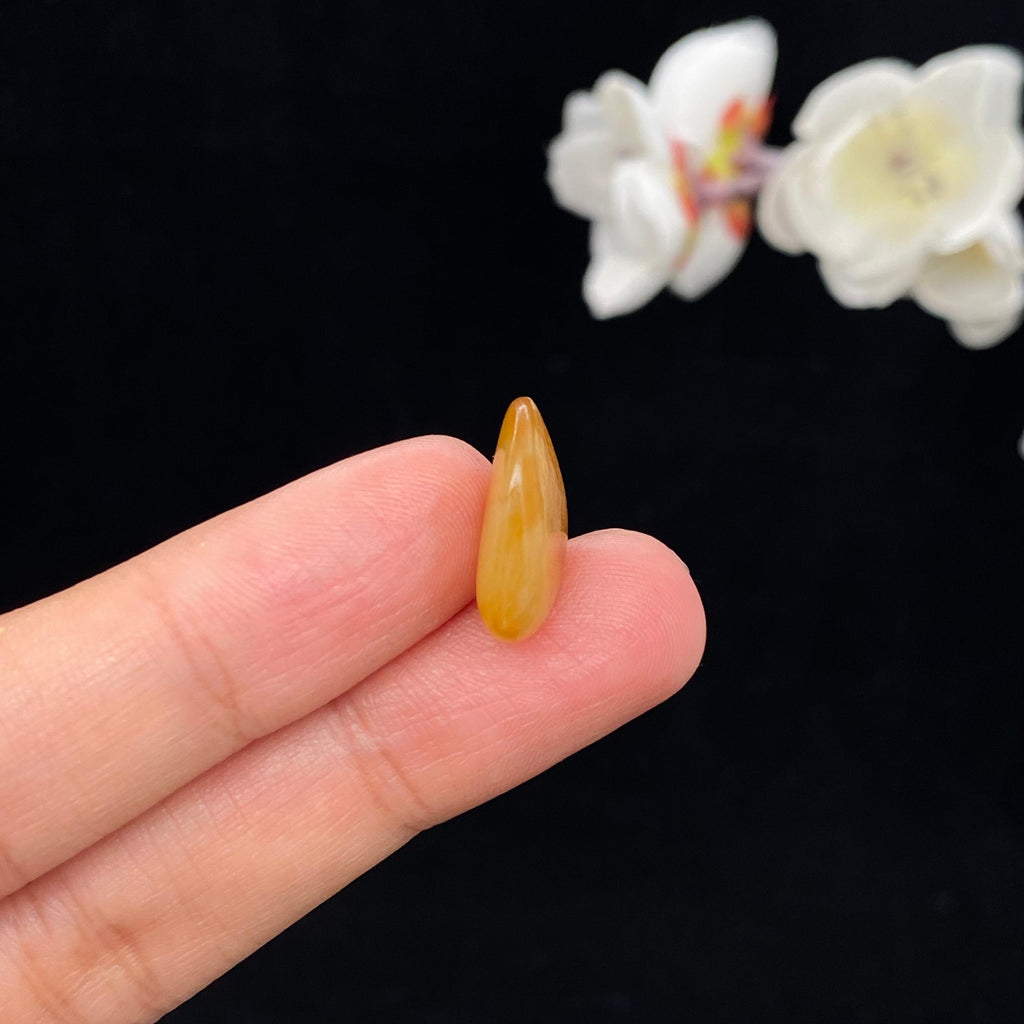 和田玉满黄皮籽料戒面籽（1.8g）