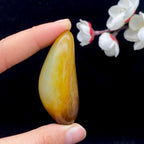 和田玉聚黄皮籽料挂件（36.9g）