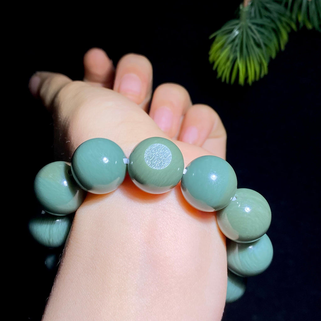 和田玉籽料沙枣青圆珠手串（89.9g）