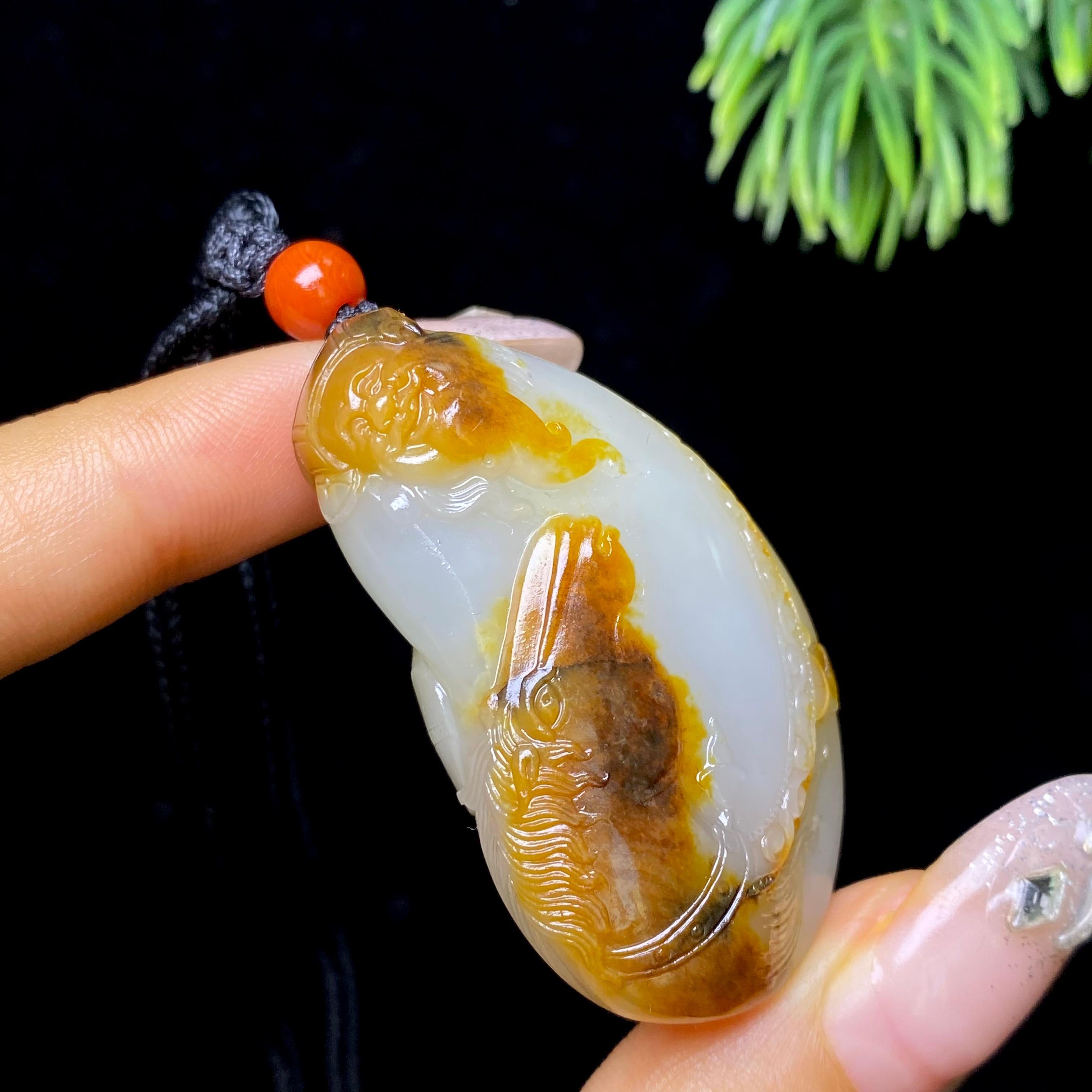 和田玉籽料财神遇马（34.4g）