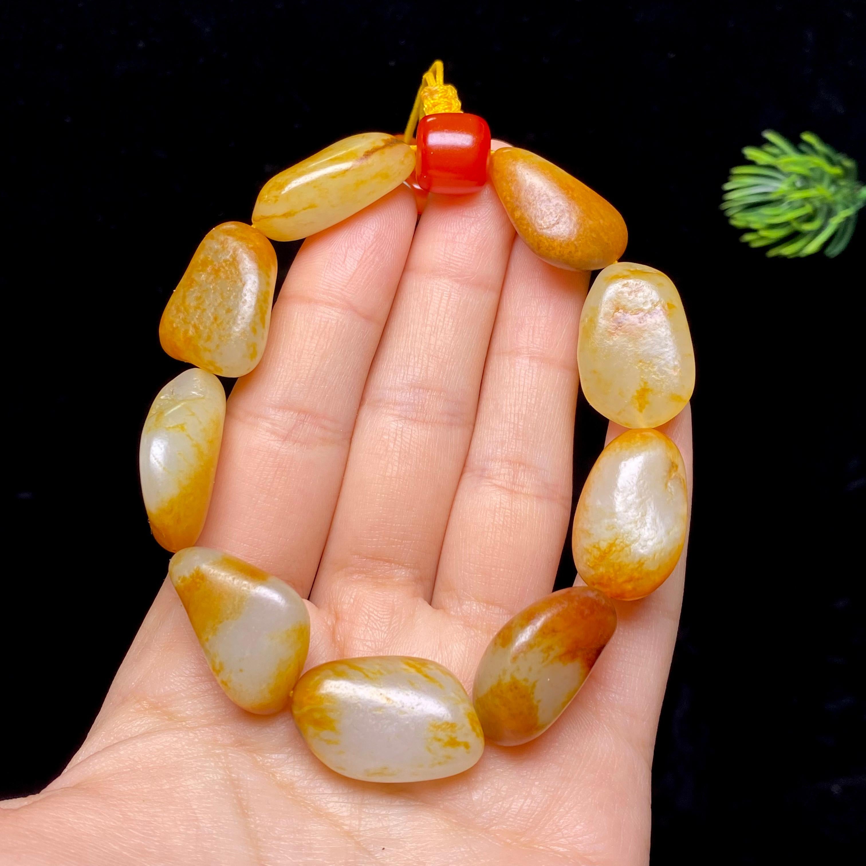 和田玉红皮籽料手串（56.6g）