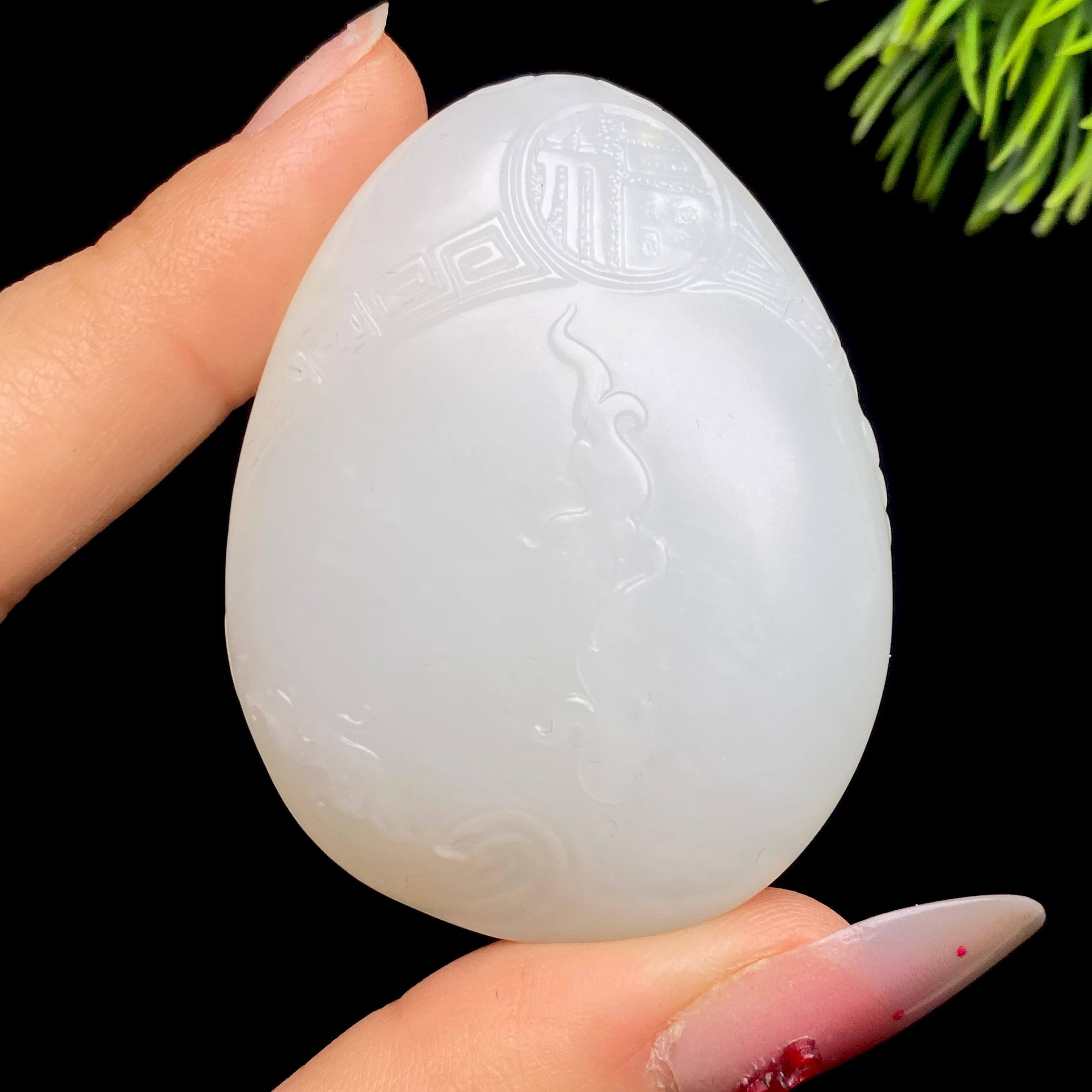 和田玉籽料龙行天下（48.5g）