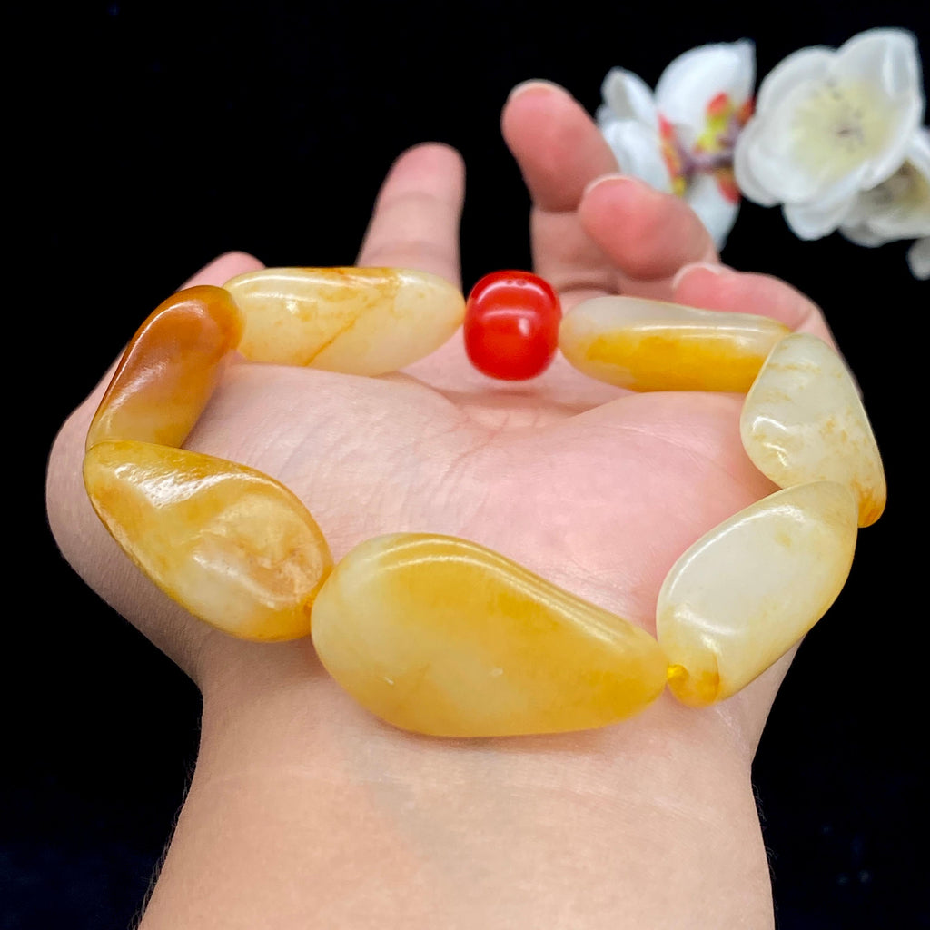 和田玉聚黄皮籽料【精品手串】（78.5g）
