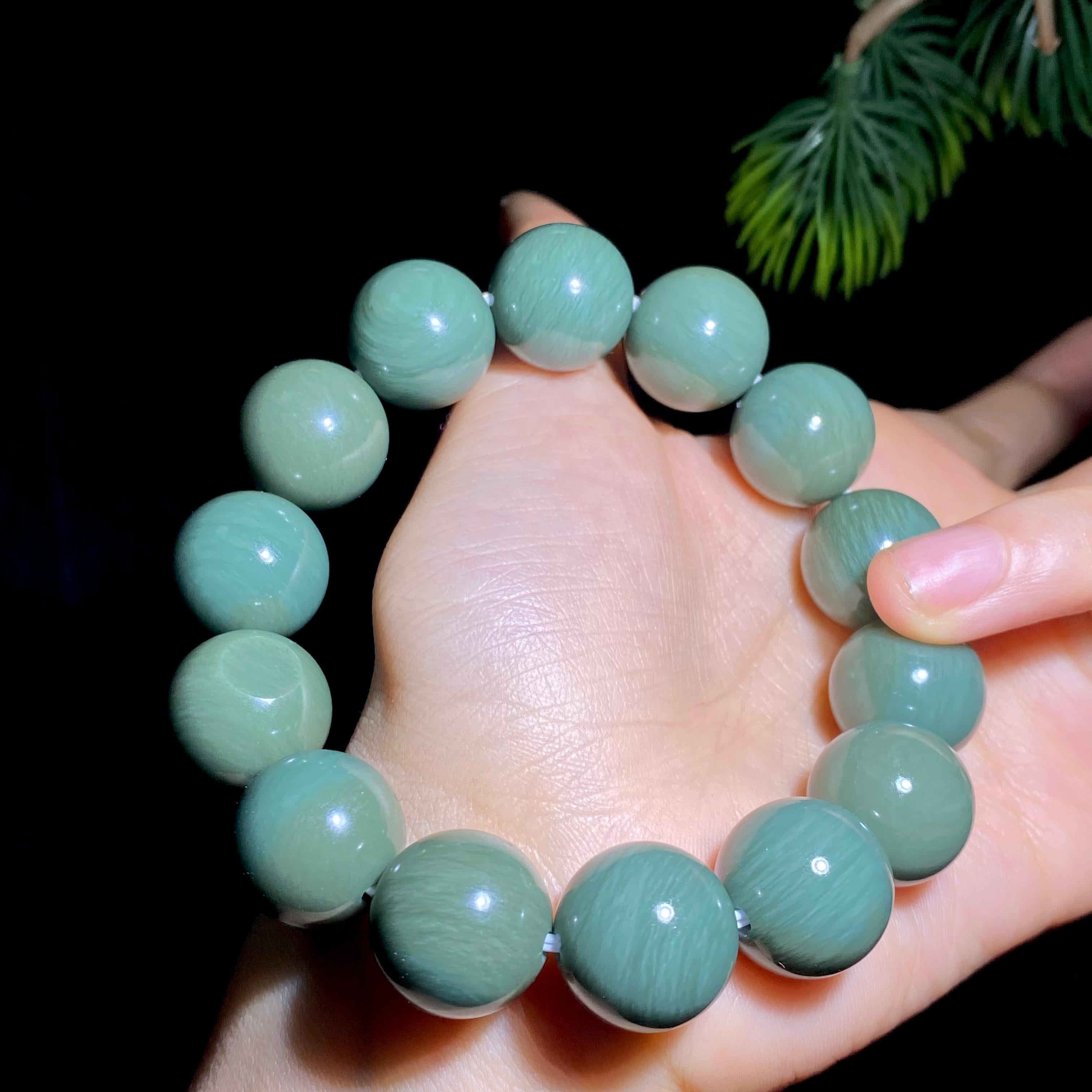 和田玉籽料沙枣青圆珠手串（89.9g）