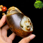和田玉-红沁皮豹子籽料把件（310.8g）