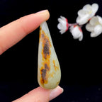 和田玉聚黄皮籽料挂件（22.4g）