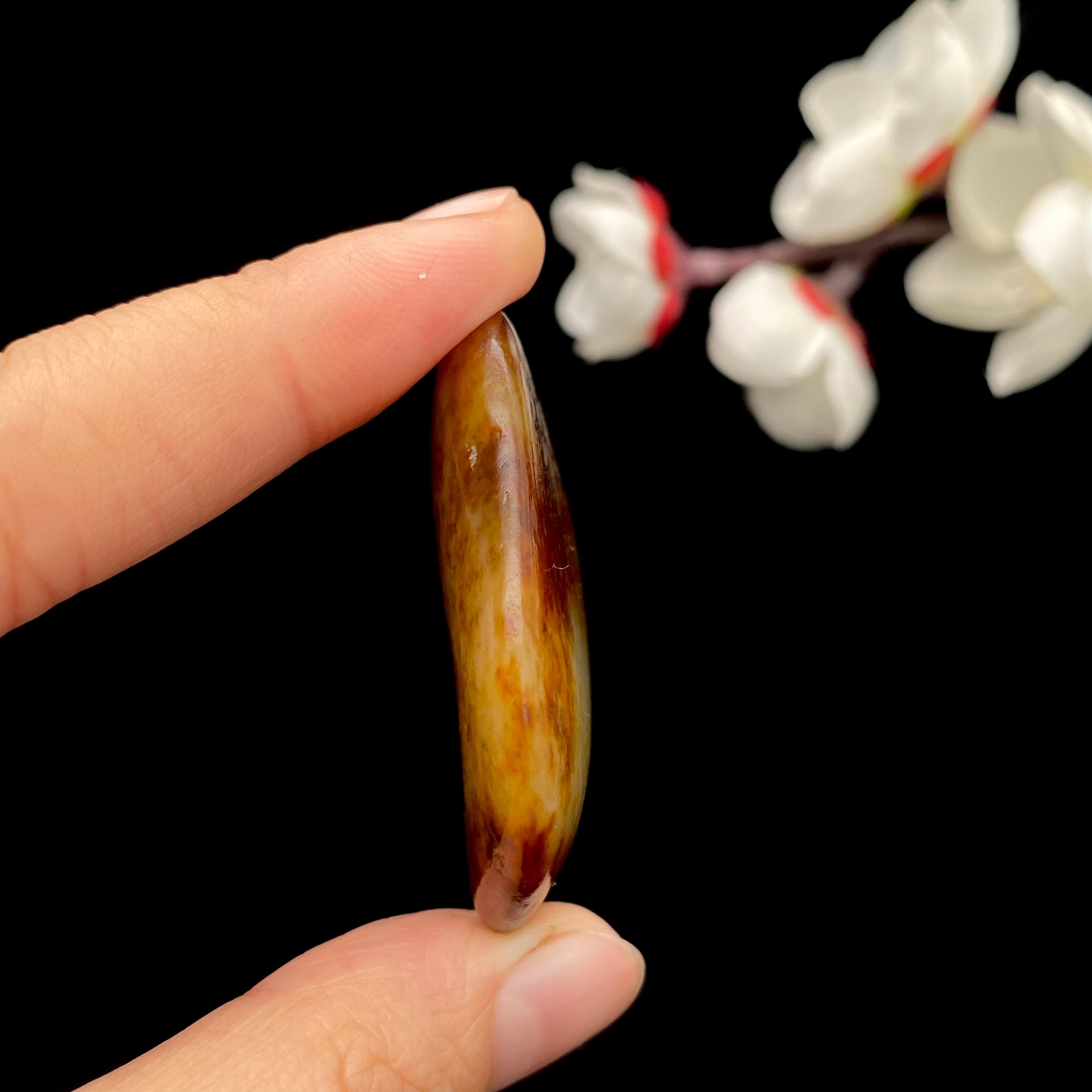 和田玉聚红皮籽料原石（24.7g）