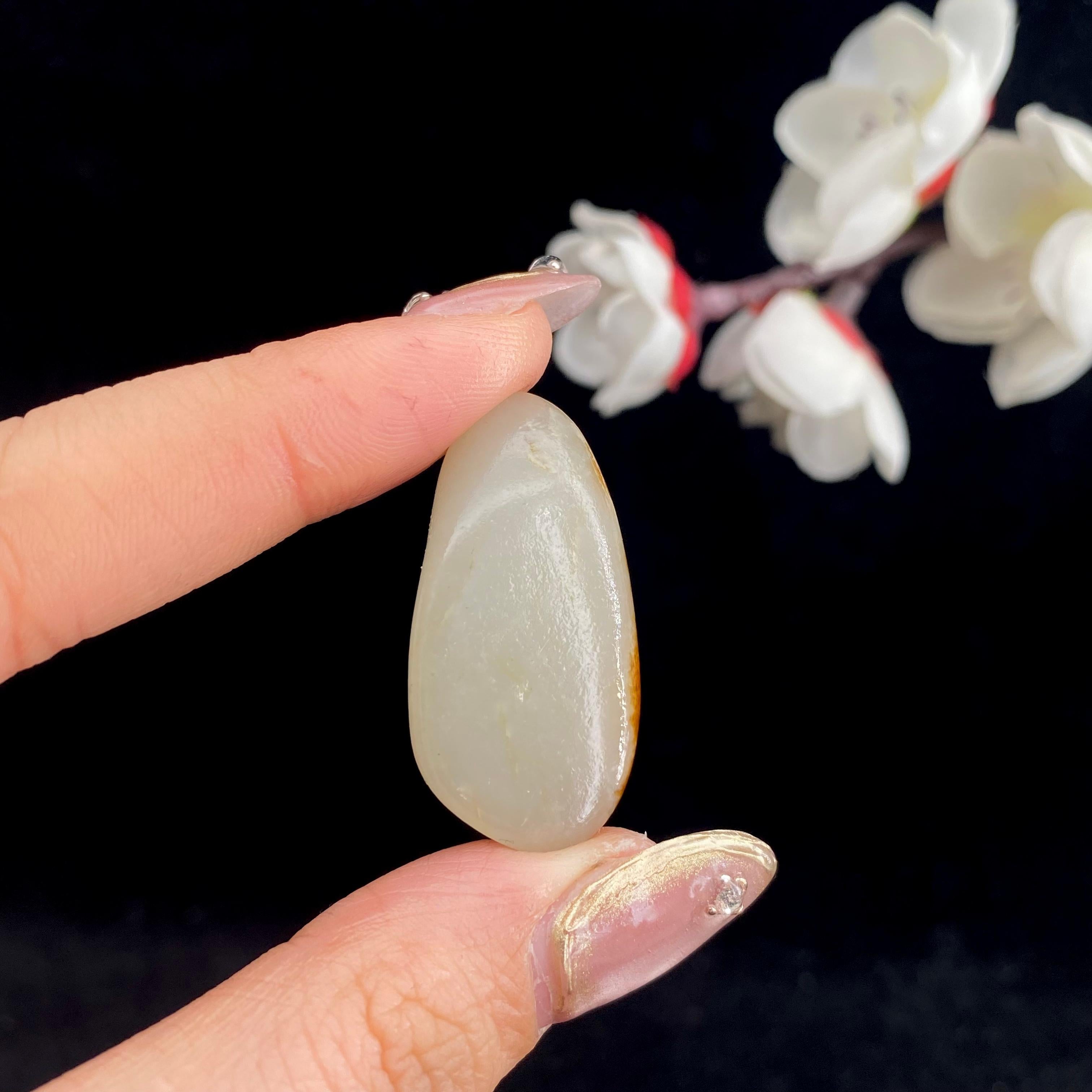 和田玉聚红皮籽料原石（9.1g）