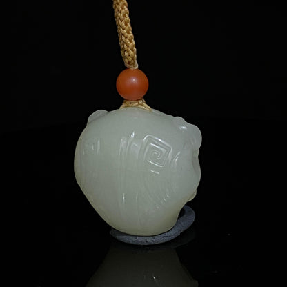 和田玉兽面挂件（16.26g）