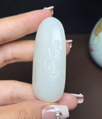 新疆和田玉且末料羊脂玉凤凰观音（31.7g）
