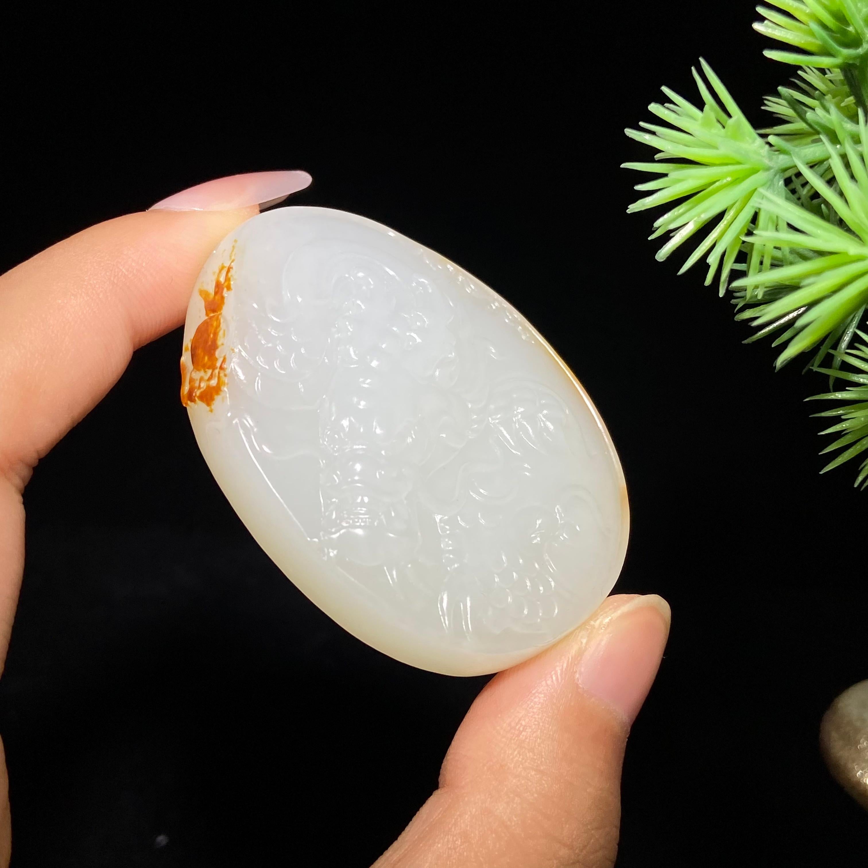 和田玉籽料龙行天下（43.8g）