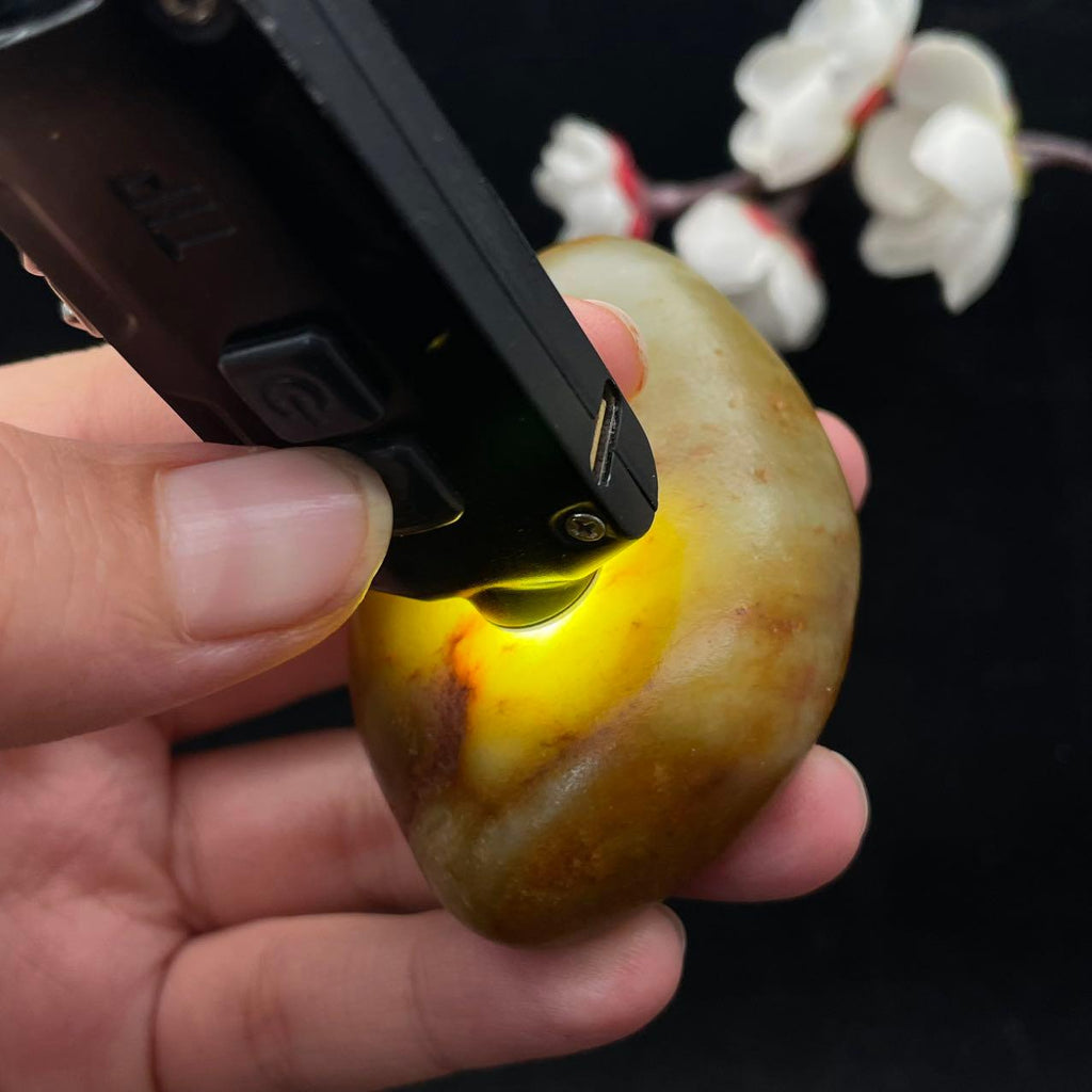 【超值推荐】和田玉聚黄皮籽料手把件（99.4g）