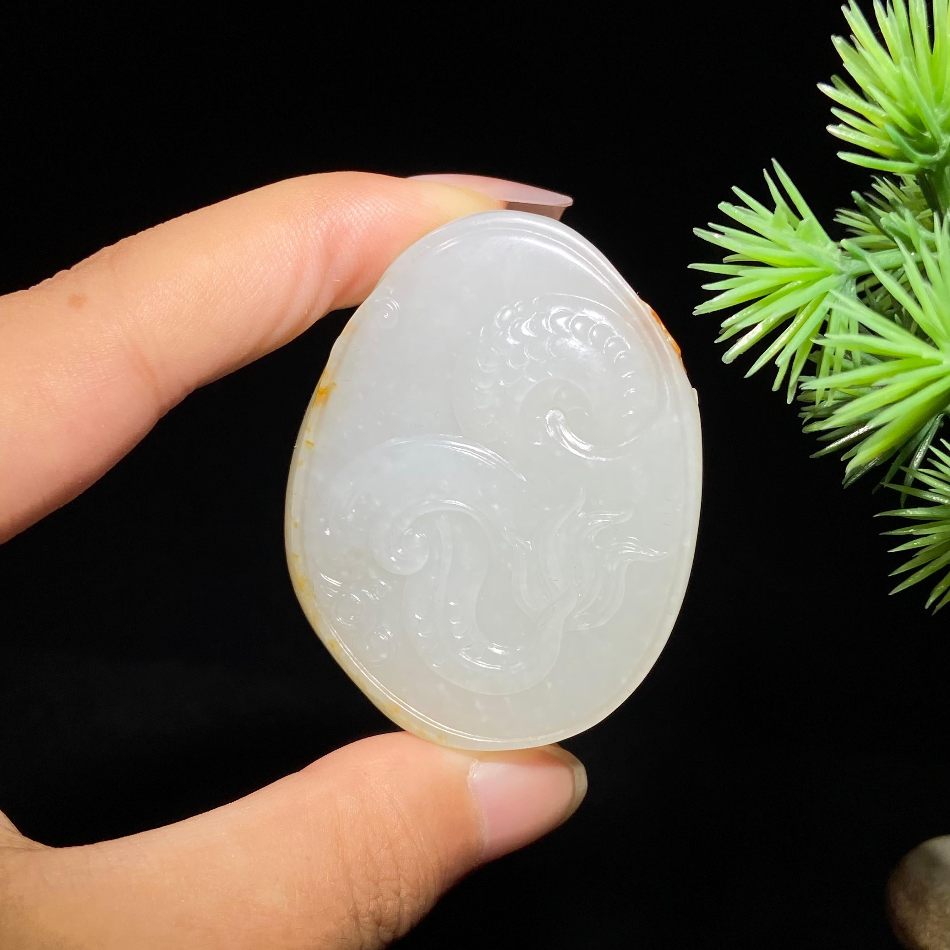 和田玉籽料龙行天下（43.8g）