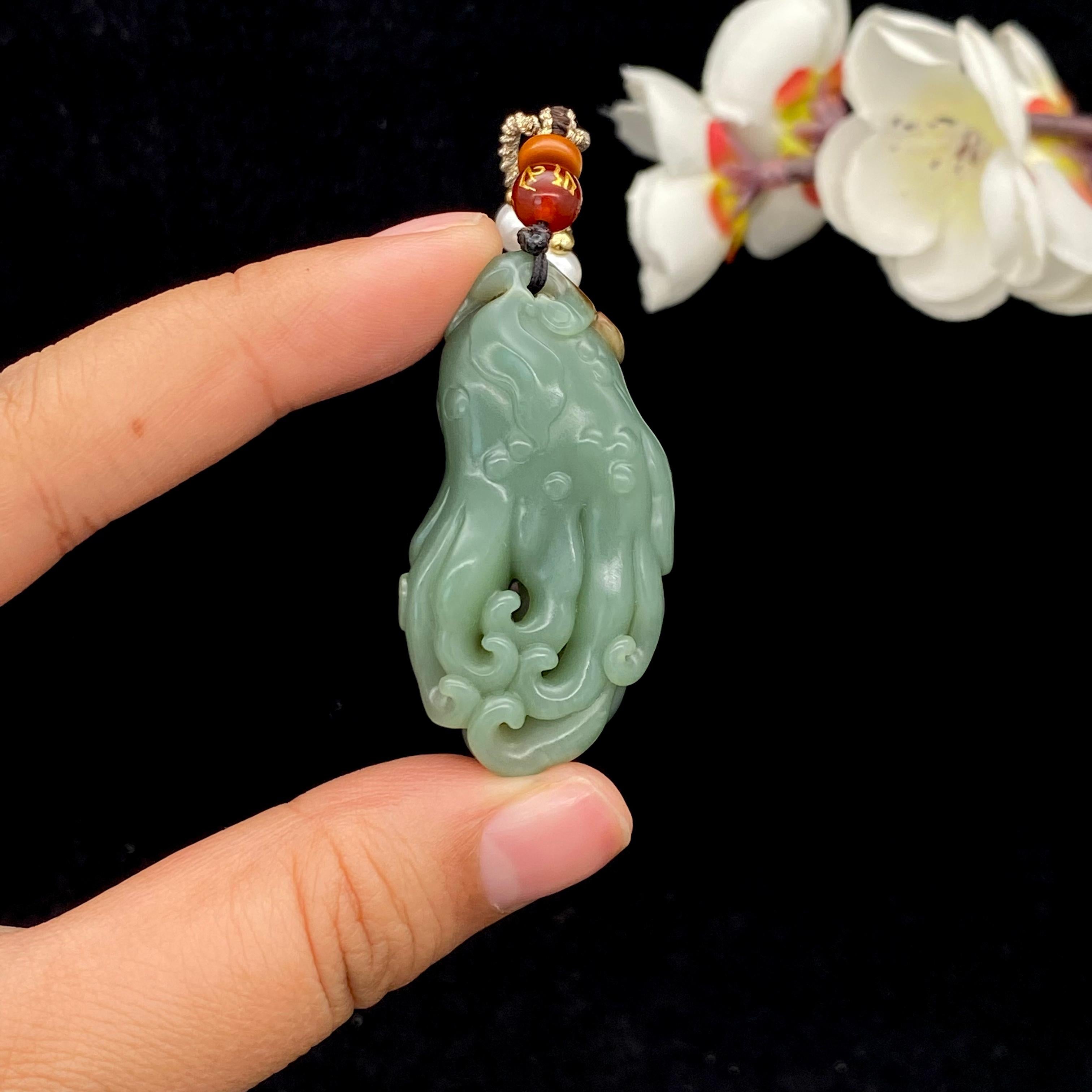 和田玉沙枣青籽料【佛手】（21.3g）