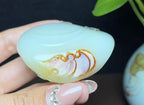 新疆和田玉籽料红皮白肉佛公（116.0g）
