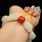 和田玉白玉带黄皮籽料【精品手串】（69.1g）