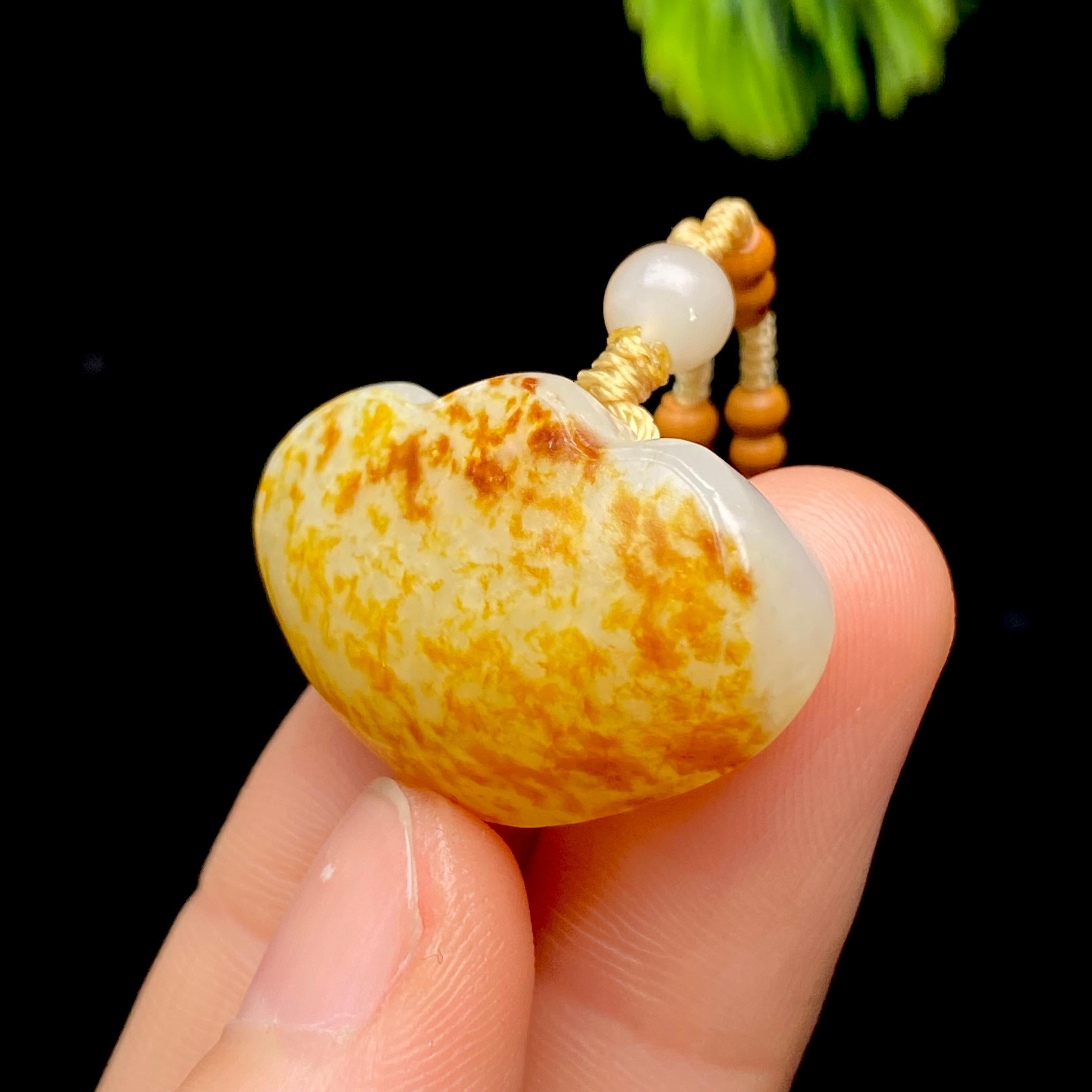 和田玉籽料平安锁（14.2g）