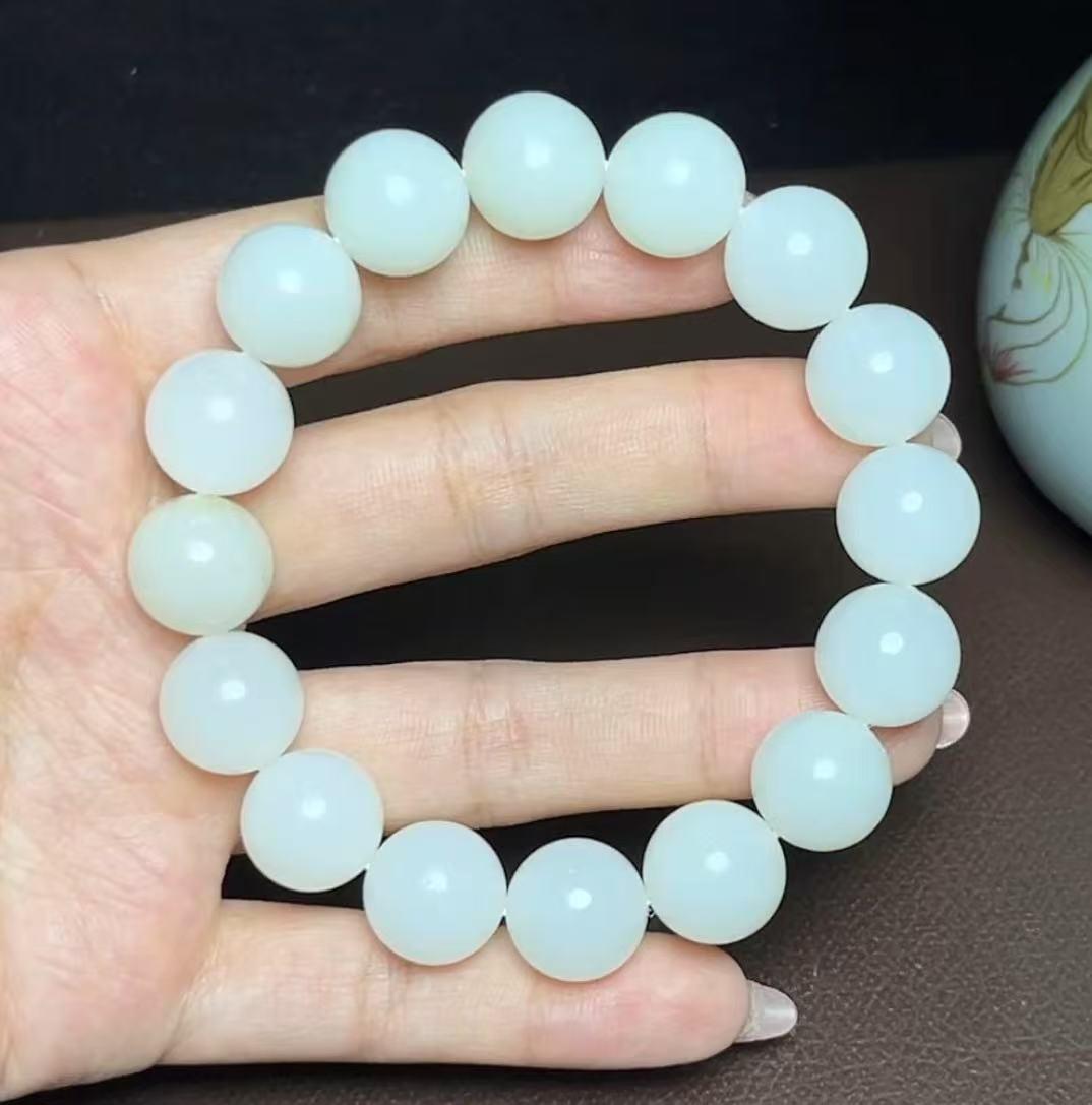 新疆 和田玉 新疆和田玉且末料羊脂玉圆珠手串（66.01g） – 厚德载玉