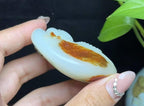 新疆和田玉籽料红皮白肉佛公（115.0g）