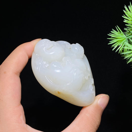 和田玉籽料童子闹佛（120.5g）
