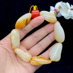 和田玉洒红皮籽料【精品手串】（90.8g）