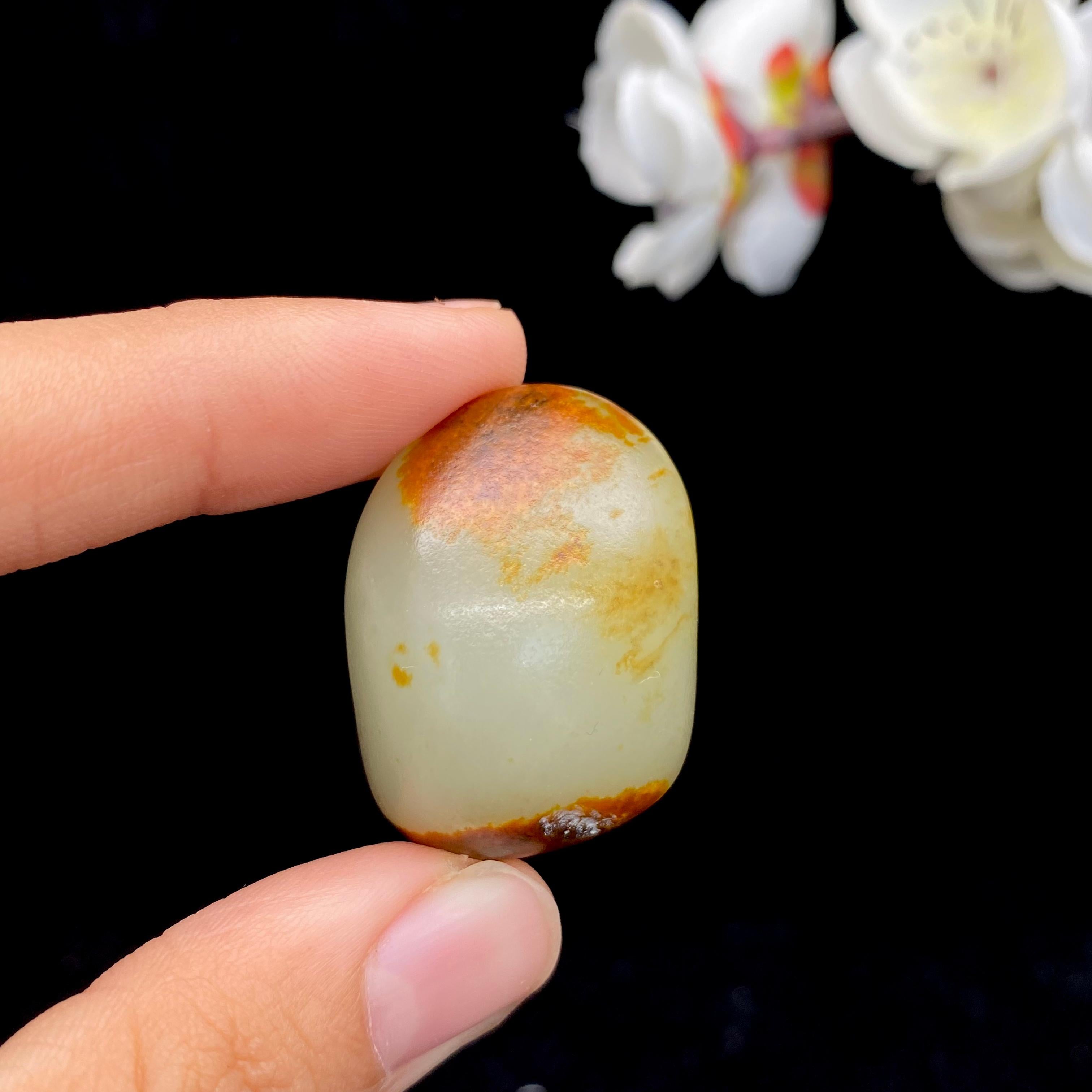 和田玉聚红皮籽料原石（25.3g）