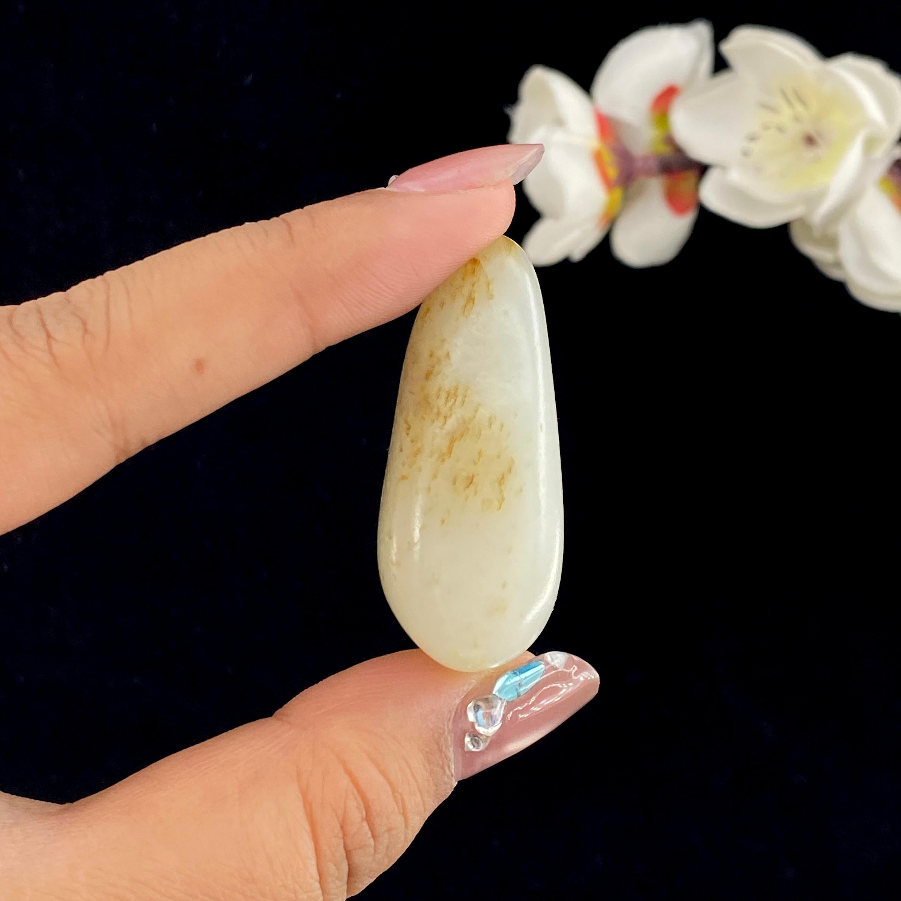 和田玉聚红皮籽料挂件（33.8g）