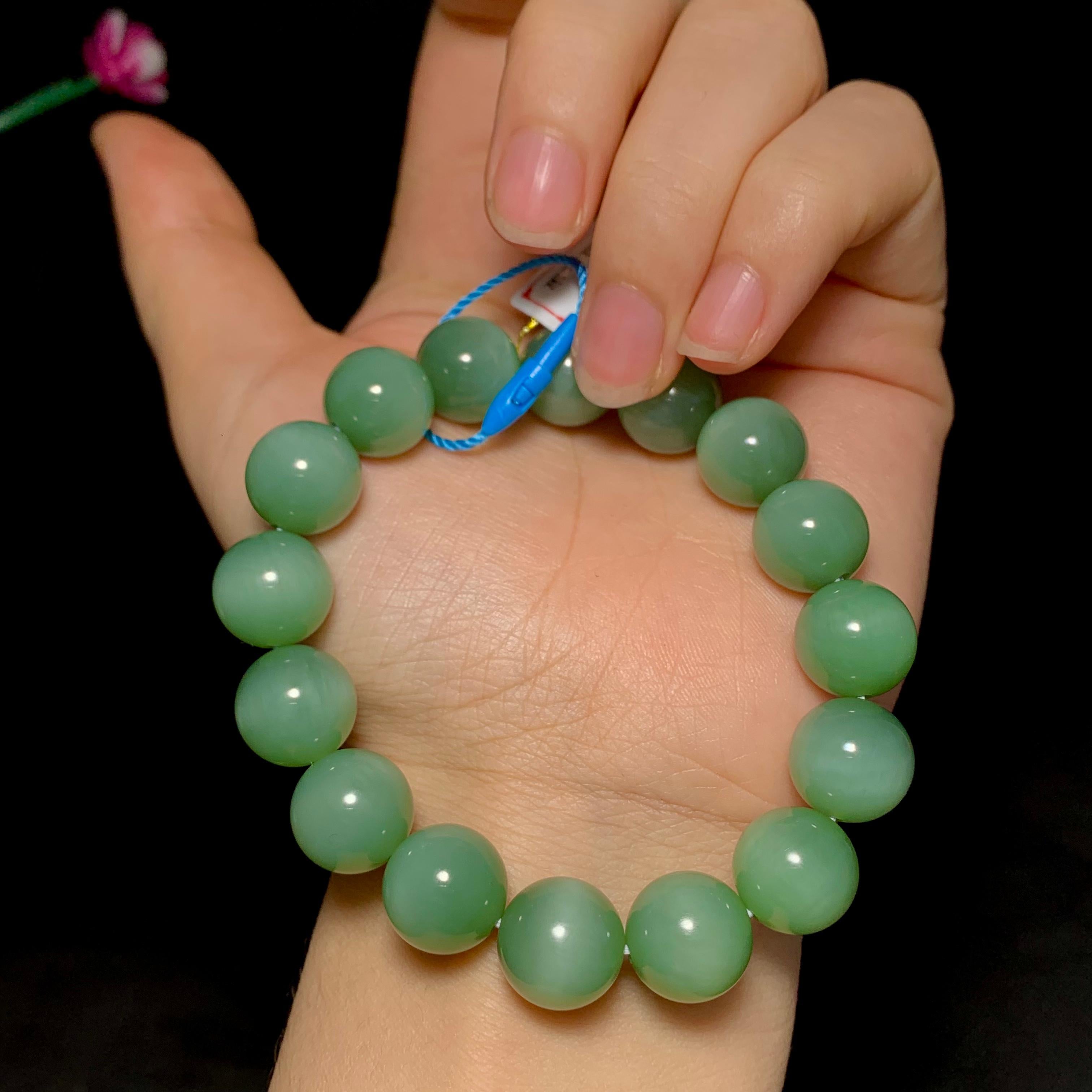 精品和田碧玉粉青猫眼手串（53.8g）