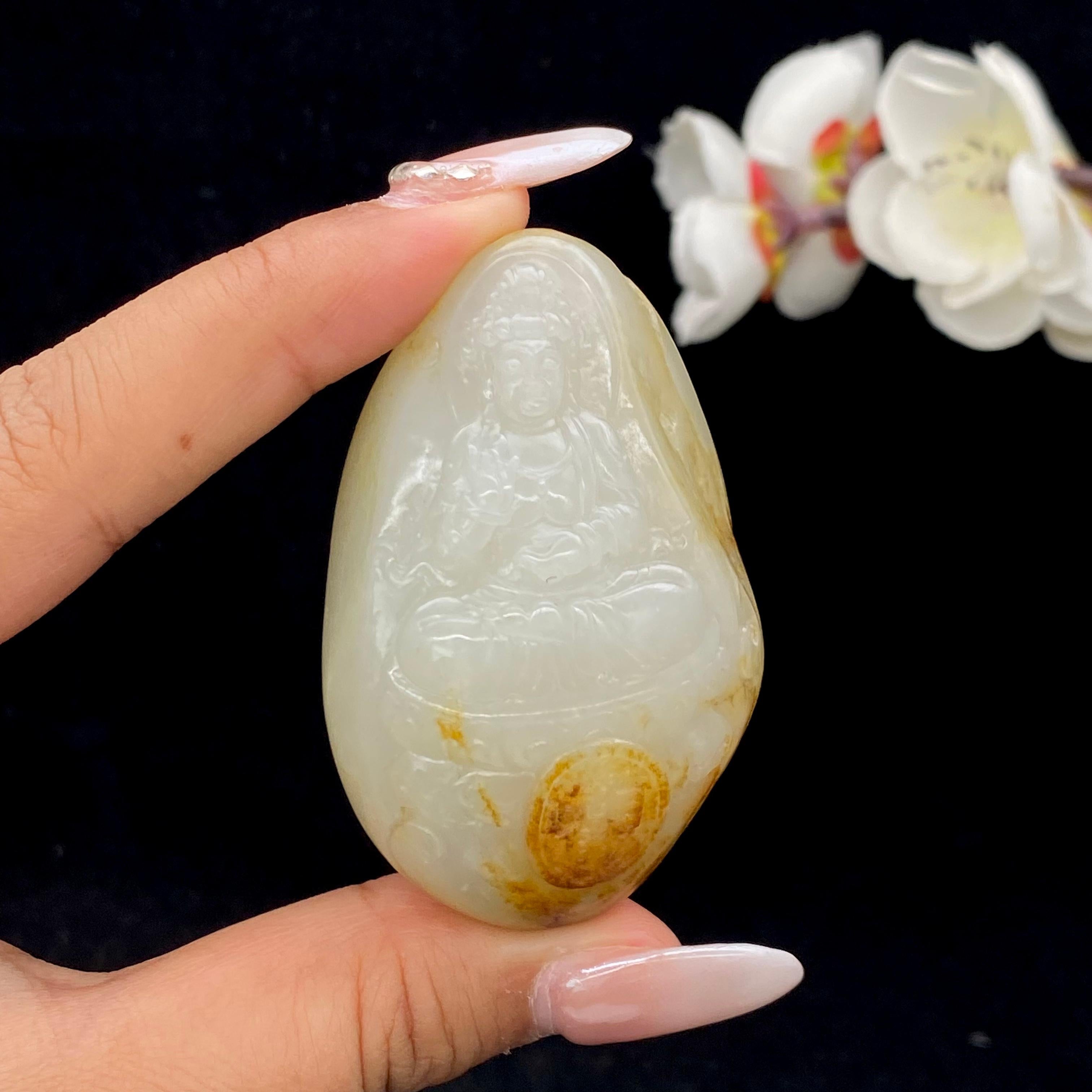 和田玉洒金皮籽料【坐观音】（85.9g）