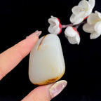 和田玉聚红皮籽料原石（33.9g）