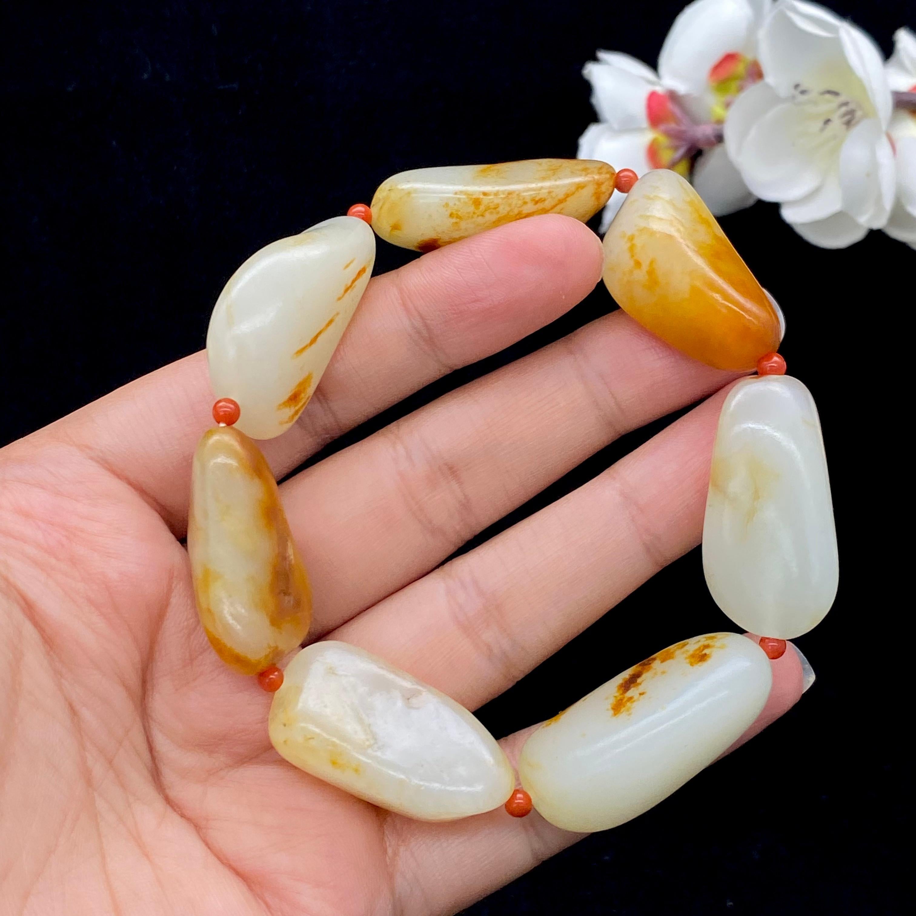 和田玉洒红皮籽料【精品手串】（70.9g）