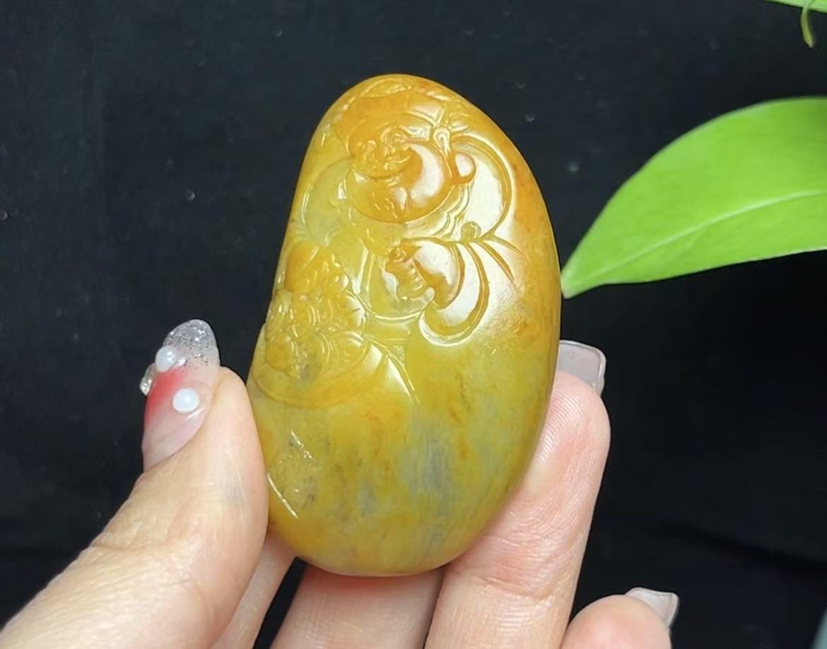 新疆和田玉籽料红沁财神（53.3g）