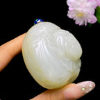 和田玉籽料花开富贵手把件（150.1g）