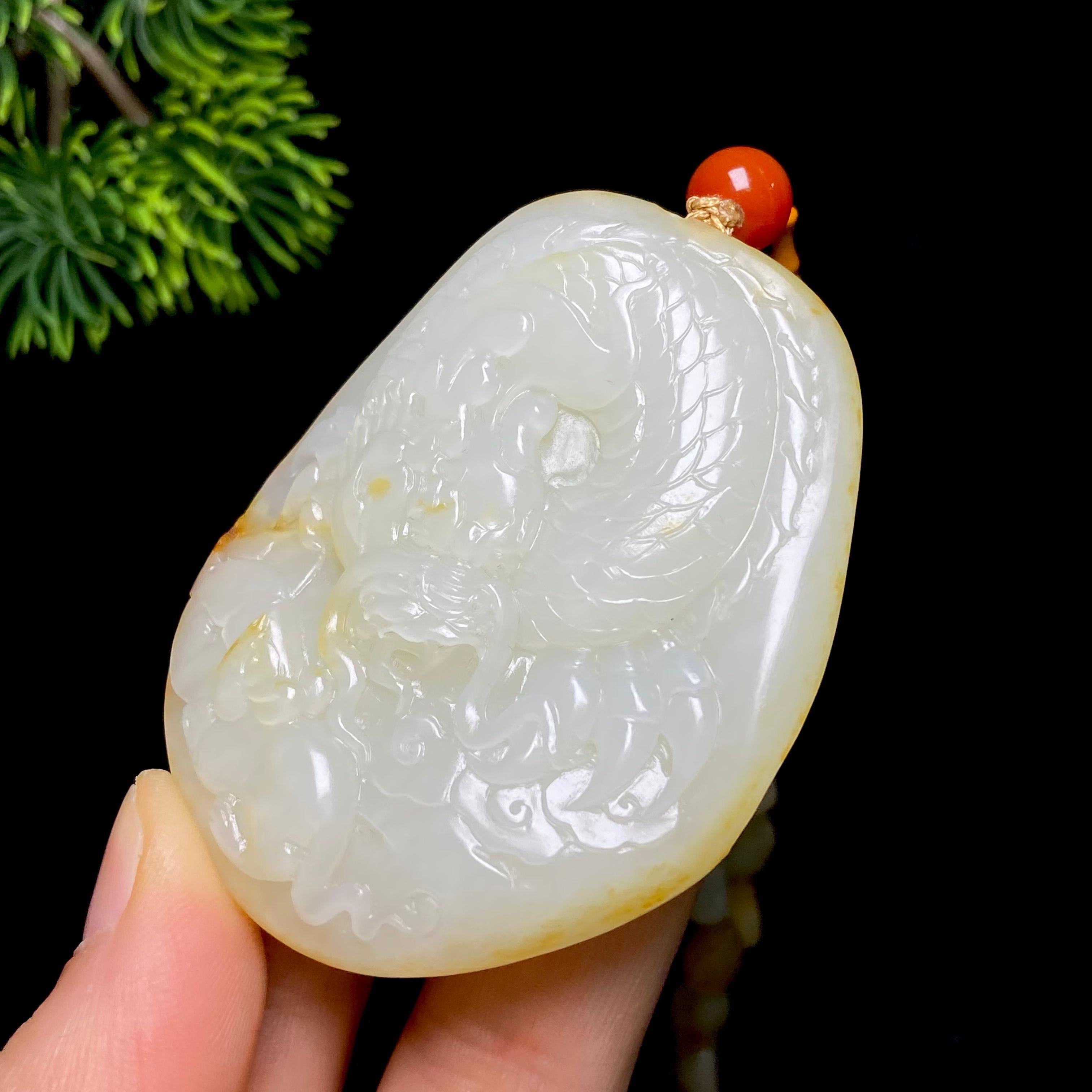 和田玉籽料龙行天下（83.6g）