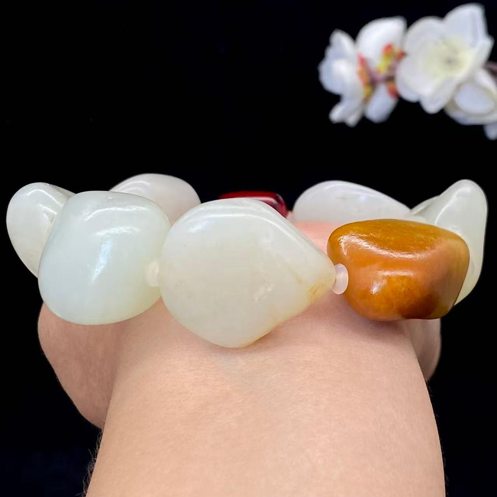 和田玉聚黄皮籽料【精品手串】（126.6g）