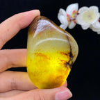 和田玉聚黄皮带翠籽料（103.9g）