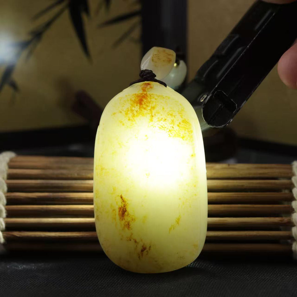 和田玉洒金皮随形无事牌（58.3g）