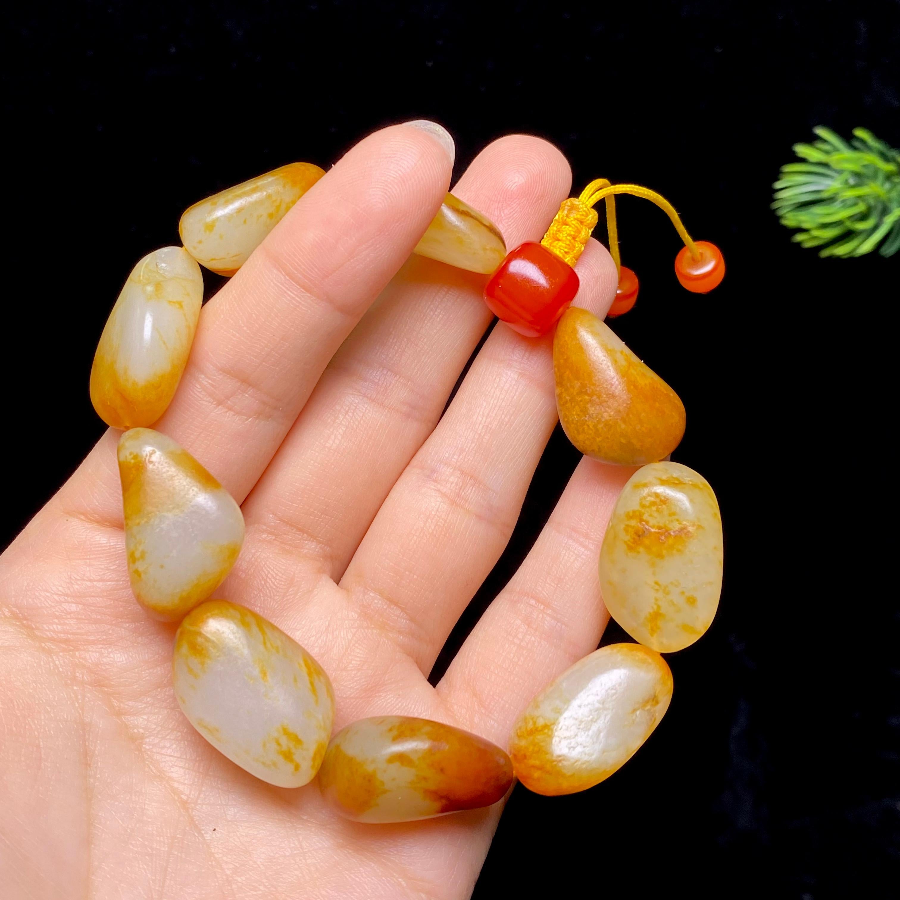 和田玉红皮籽料手串（56.6g）