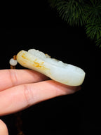 和田玉籽料撒金皮观音（86.3g）
