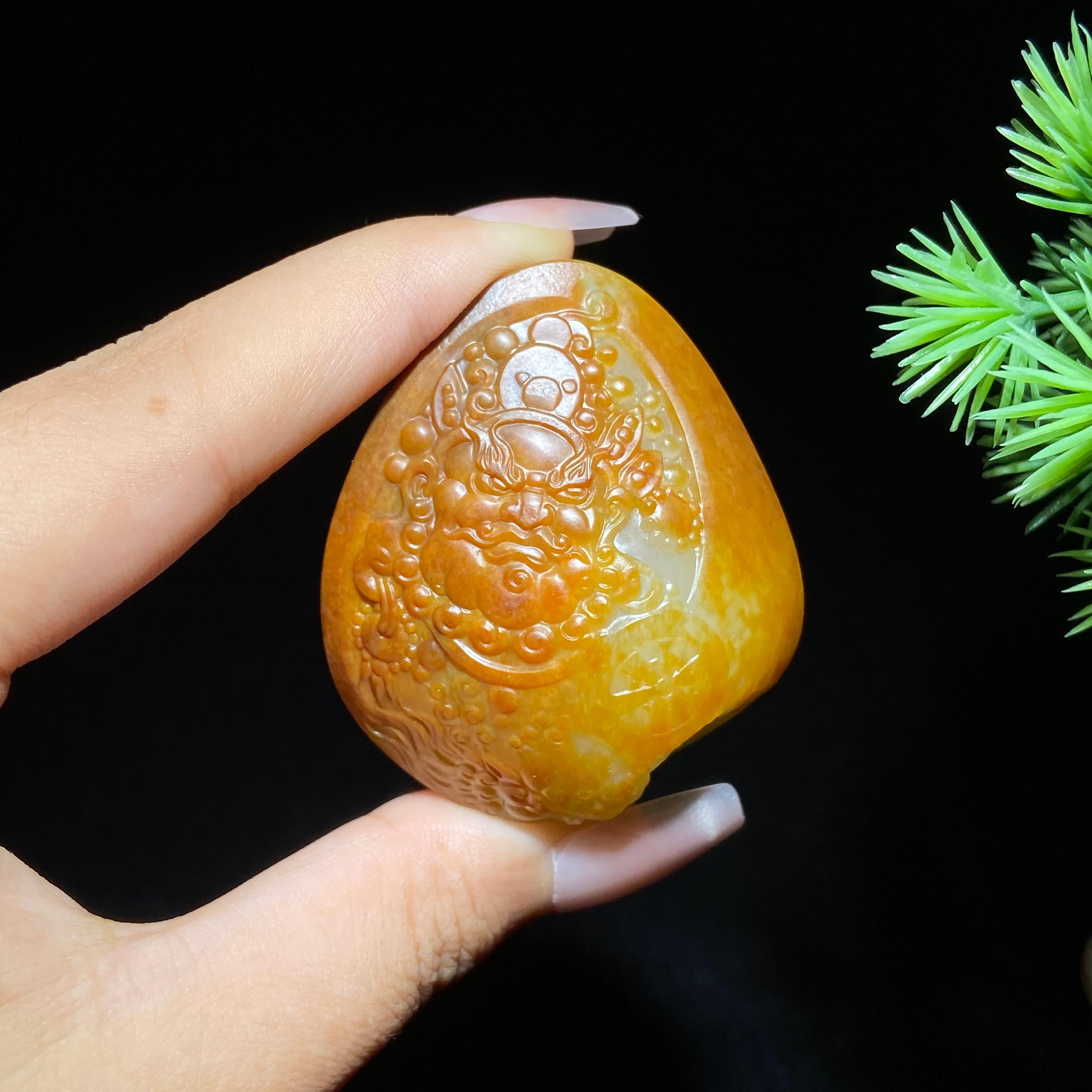 和田玉籽料黄财神（53.5g）